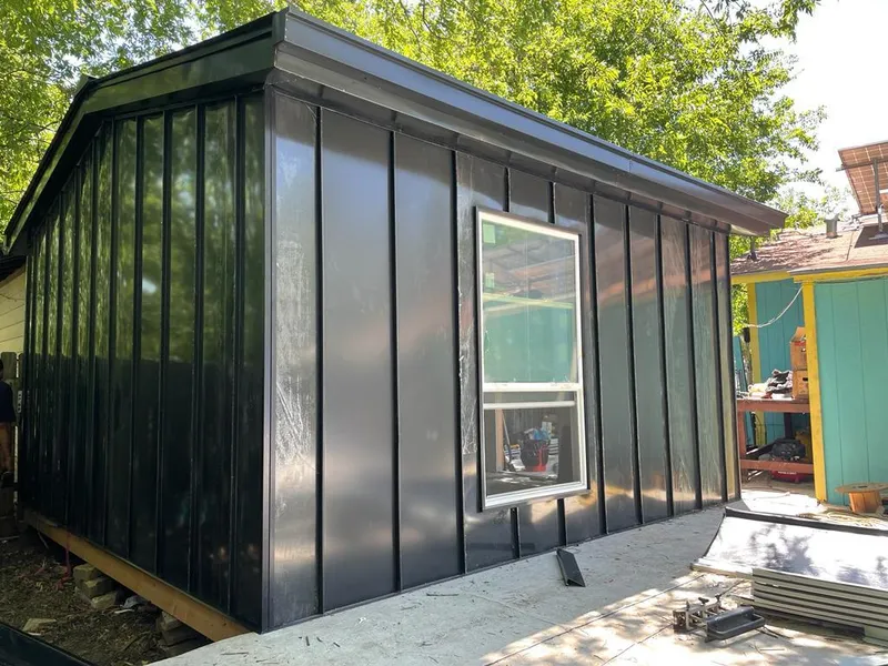 Black standing seam metal wall panels for Roof Inspection in Fredonia