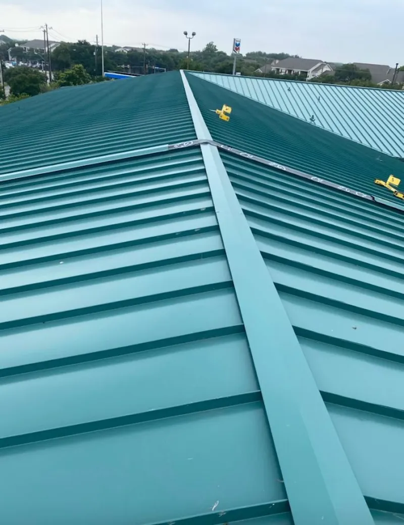 Green commercial metal roof ridge and valley for Metal Roof Repair in Fredonia